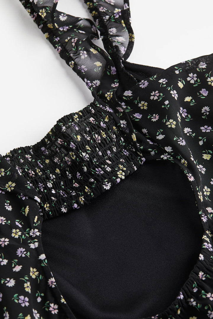 Kleita ar ziedu rakstu,  melna