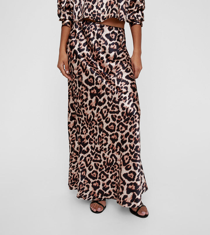 Dzīvnieku apdrukas krekls un svārku komplekts