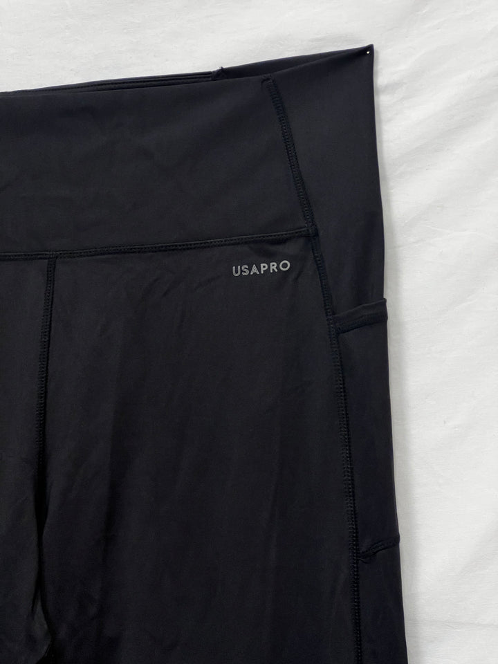 Melni sporta legingi