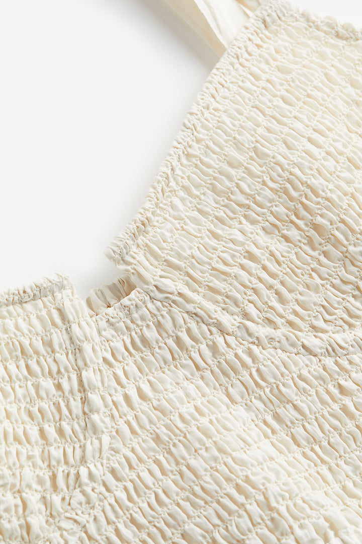 Īss topiņš, balts